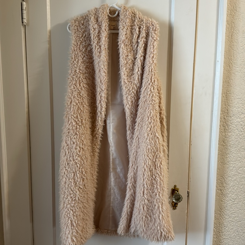 Soft as butter, long sleeveless sweater